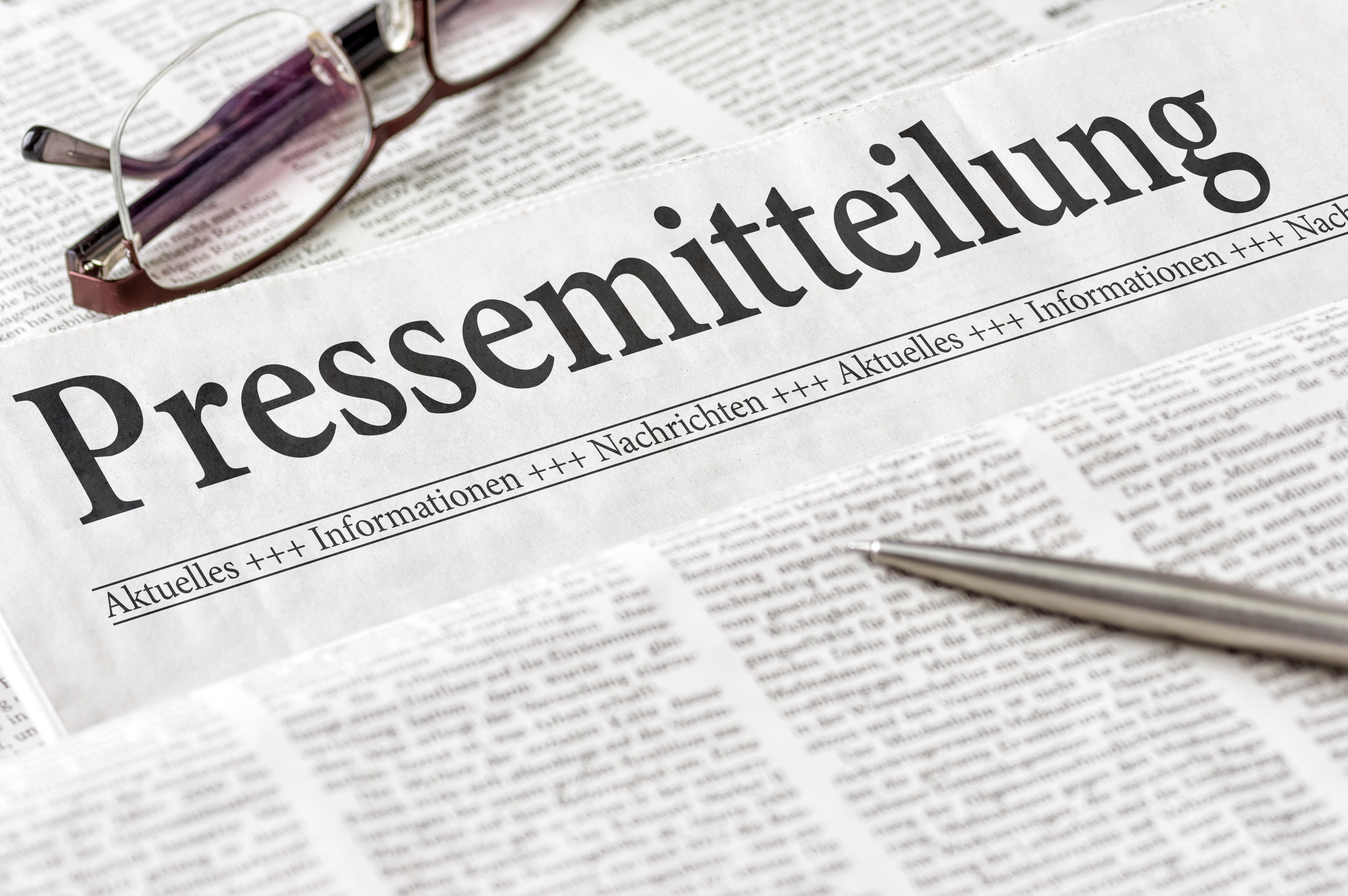 Newspapers with press release lettering