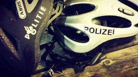 Bicycle helmets with German and Dutch lettering