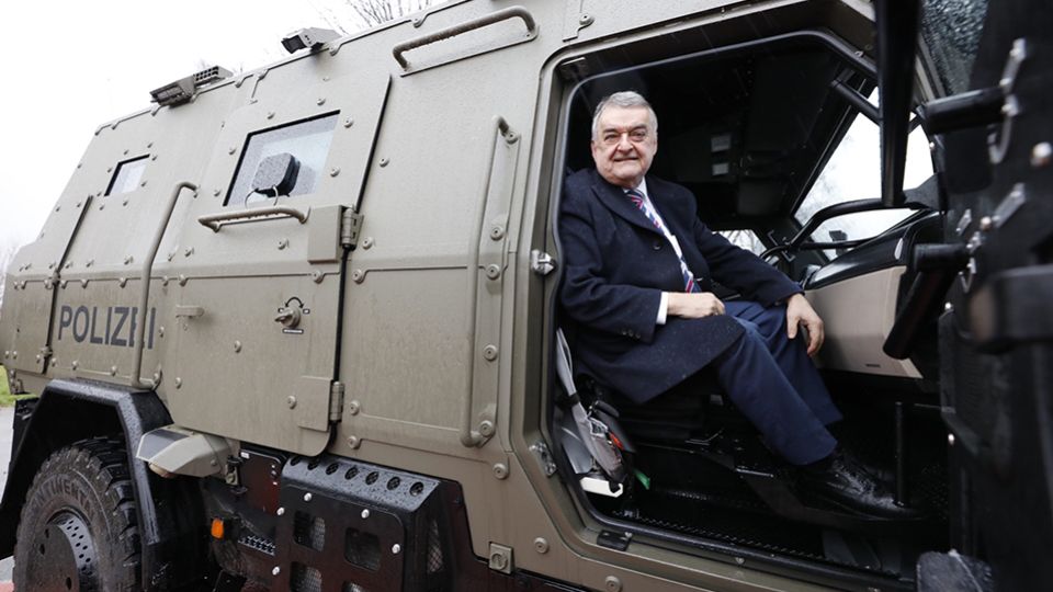 Interior Minister Herbert Reul in the 'Survivor R' anti-terror vehicle