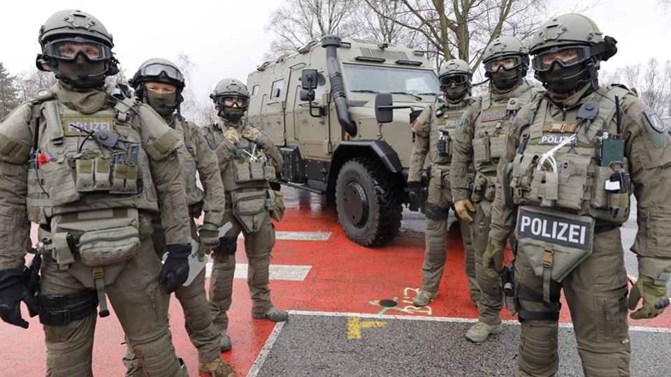 Special task force in front of the 'Survivor R' anti-terror vehicle